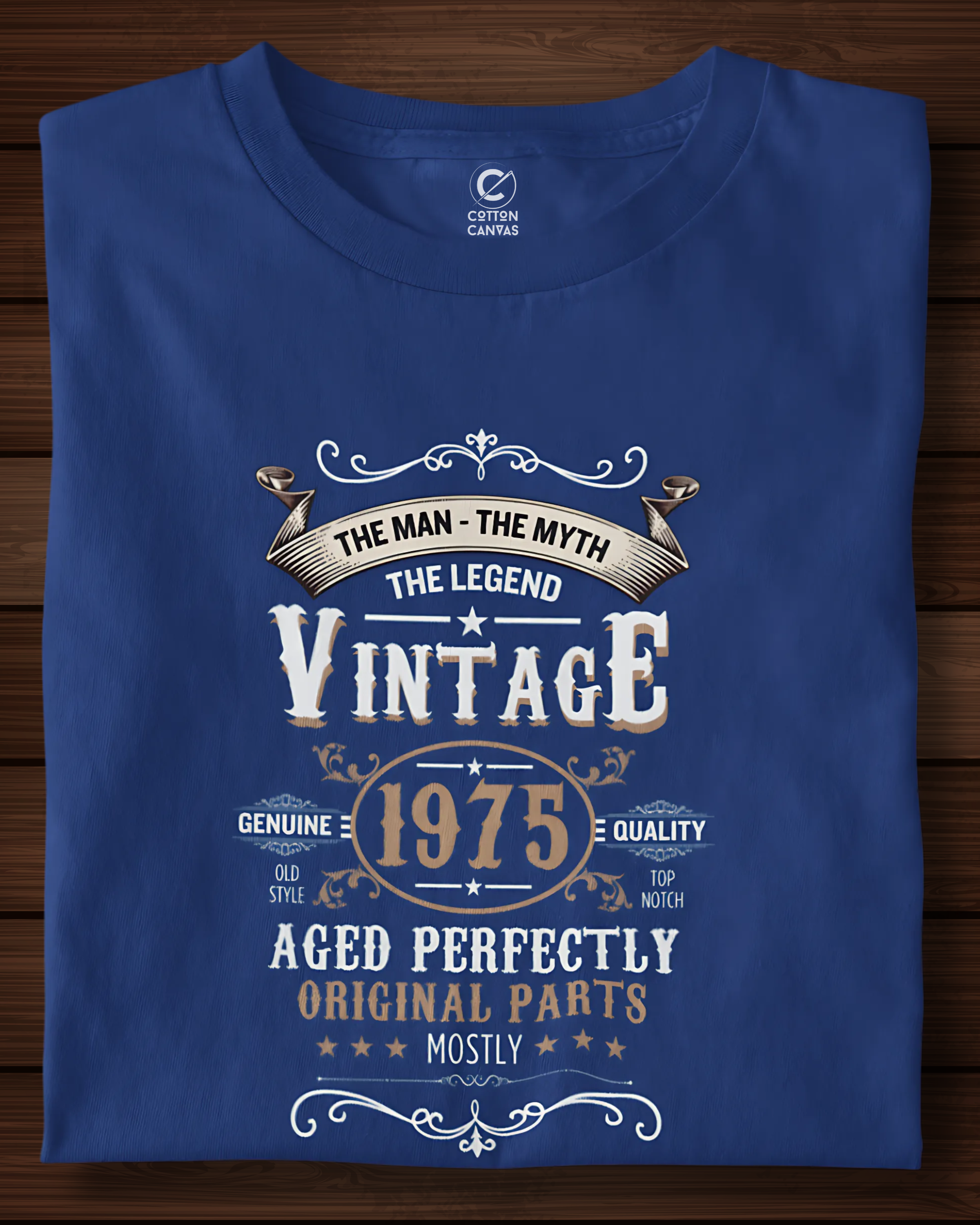 Folded blue t-shirt with vintage design on a wooden surface