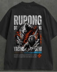 A black short-sleeve t-shirt shown from the back, featuring a large graphic print with the word 'RUPONG' in distressed white letters, a lion, smoke, flames, and blue accents on a dark gray textured background.