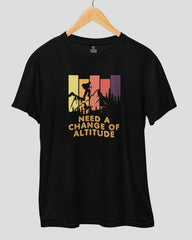 Black t-shirt with mountain graphic and text on a gray background