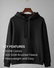 Black hoodie on a hanger with key features text on a gray background