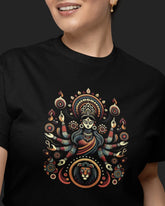 A close-up of a person wearing a black short-sleeve t-shirt with a detailed graphic print of a Hindu goddess Durga and a lion on the front.