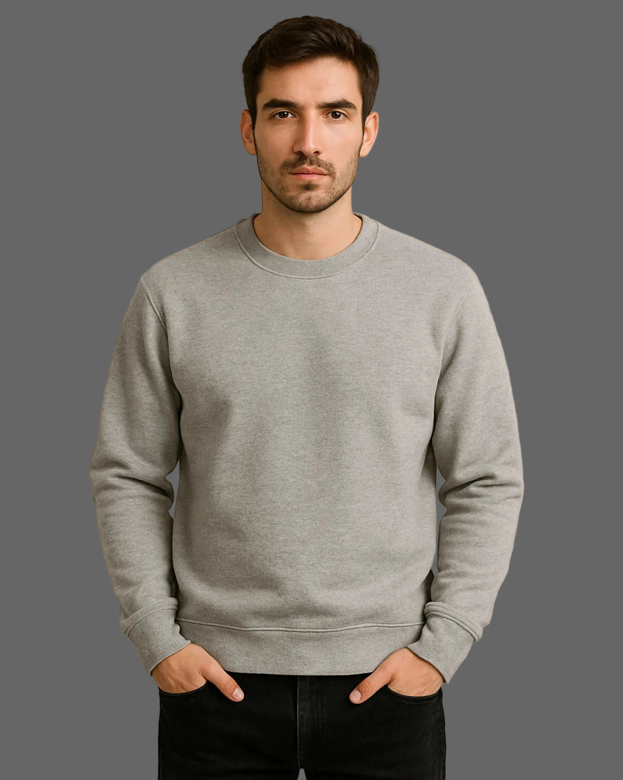Man wearing a gray sweatshirt against a beige background
