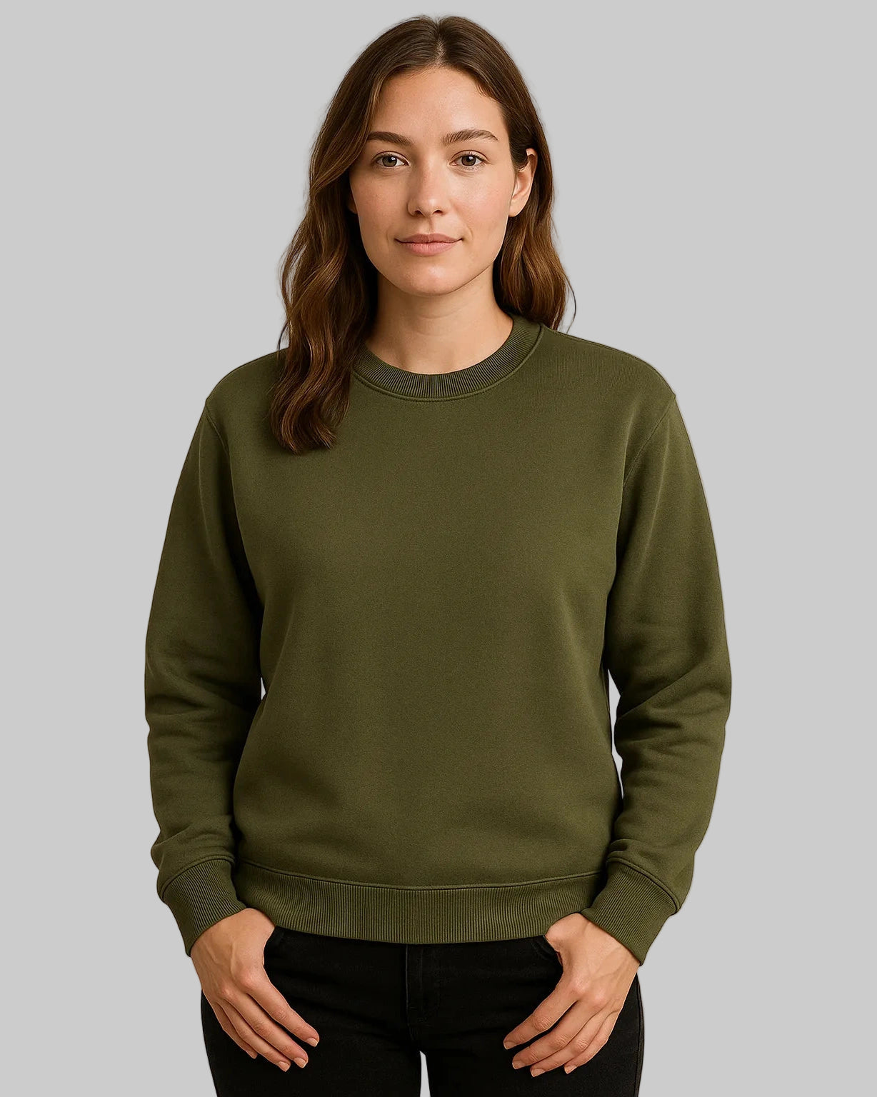 Woman wearing an olive green sweatshirt against a plain background