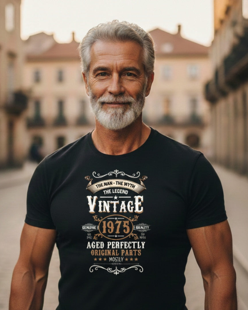 Man wearing a black t-shirt with vintage design in an urban setting