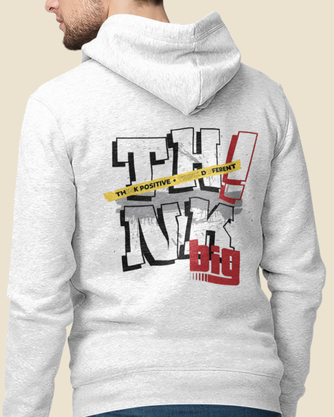 Gray hoodie with text design on the back, worn by a person.