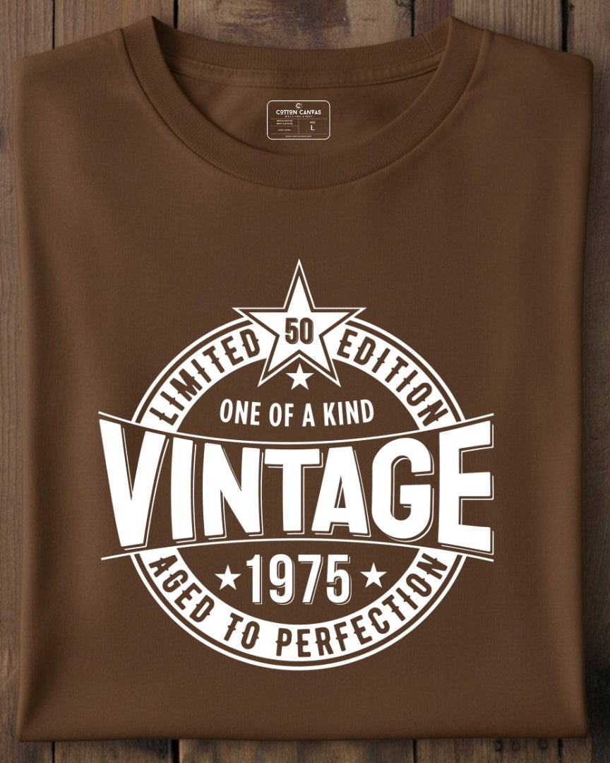 Brown t-shirt with vintage design on a wooden surface