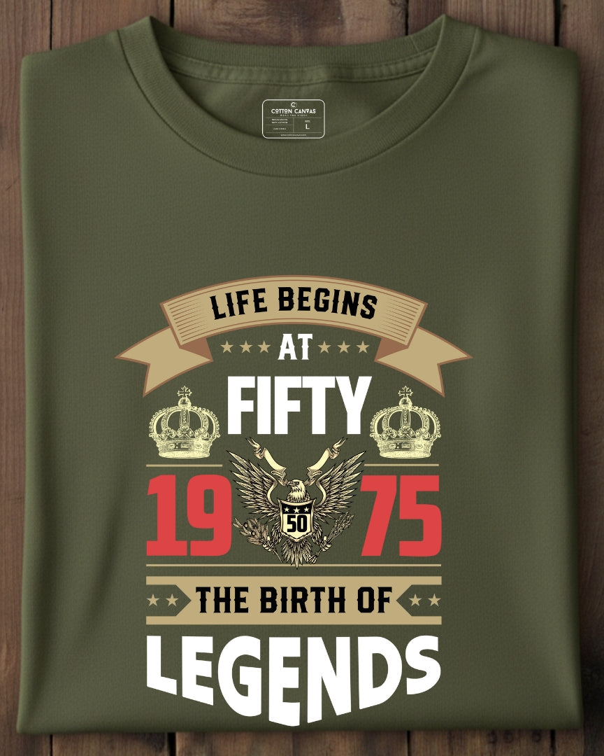 Green t-shirt with birthday design on a wooden surface