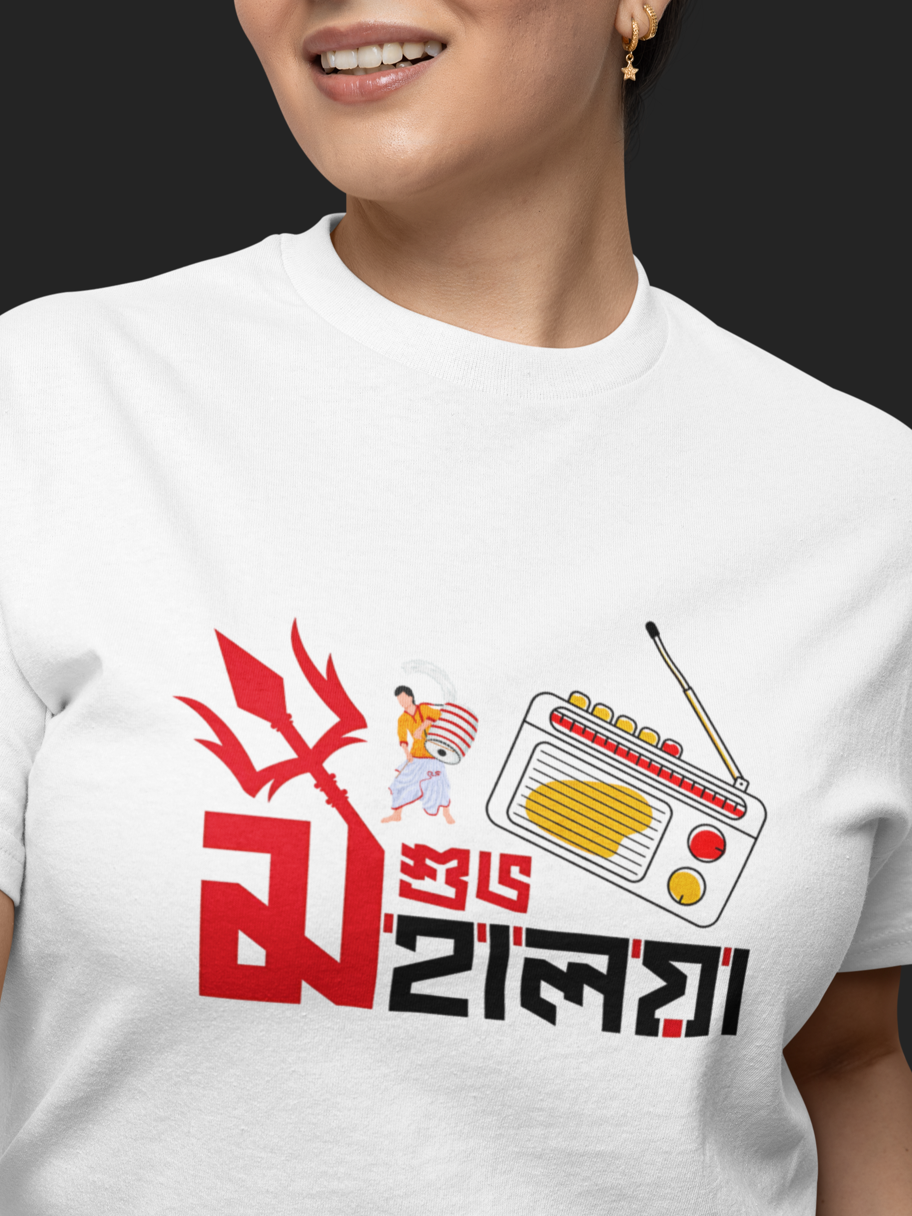 Person wearing a white t-shirt with a graphic design on a black background
