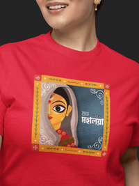 Person wearing a red t-shirt with a colorful graphic design on a black background