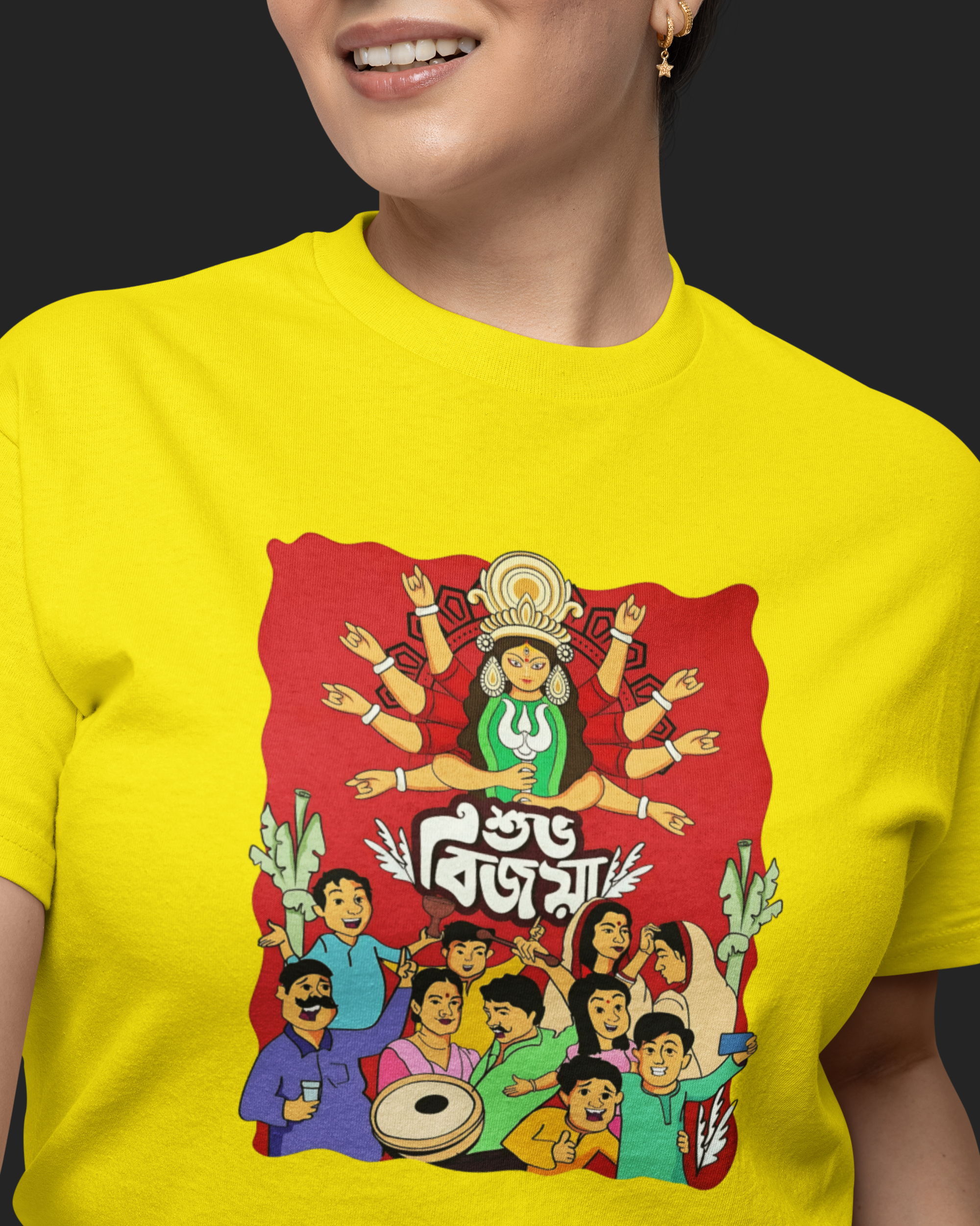 Person wearing a yellow t-shirt with a colorful graphic design on a black background