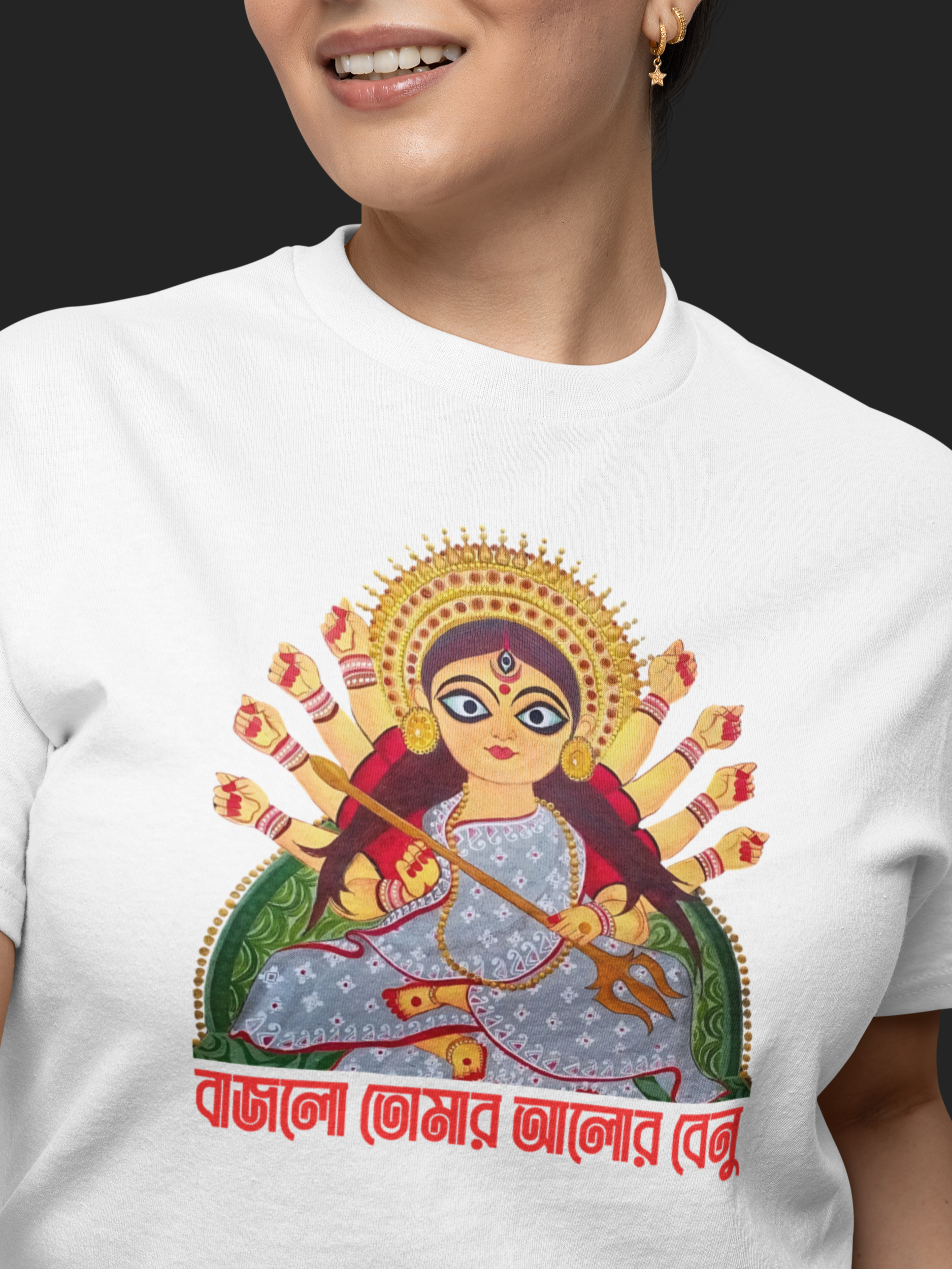 White t-shirt with a colorful graphic design of a deity on a black background