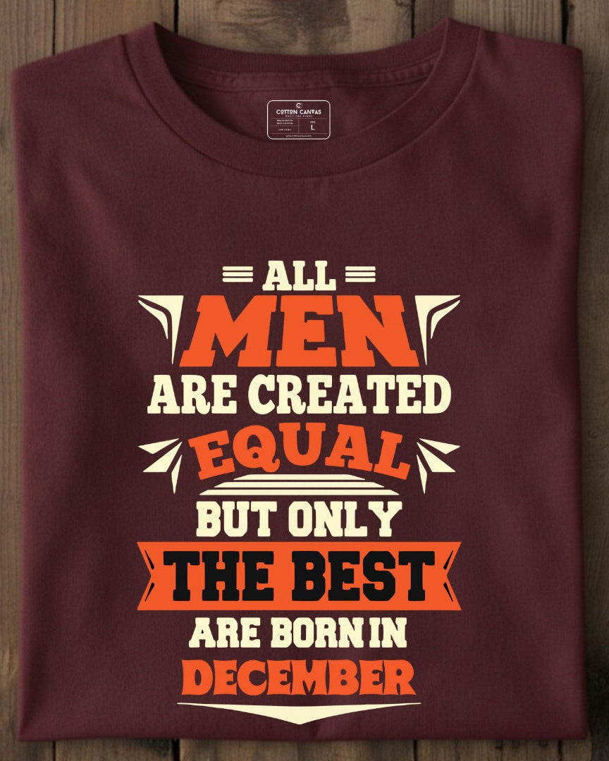 Maroon t-shirt with humorous text design on a wooden surface