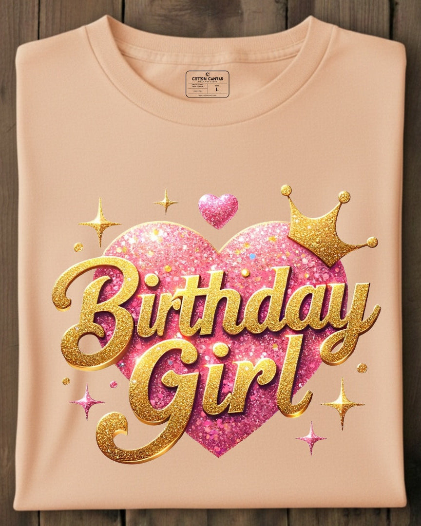 Pink t-shirt with 'Birthday Girl' text on a wooden background