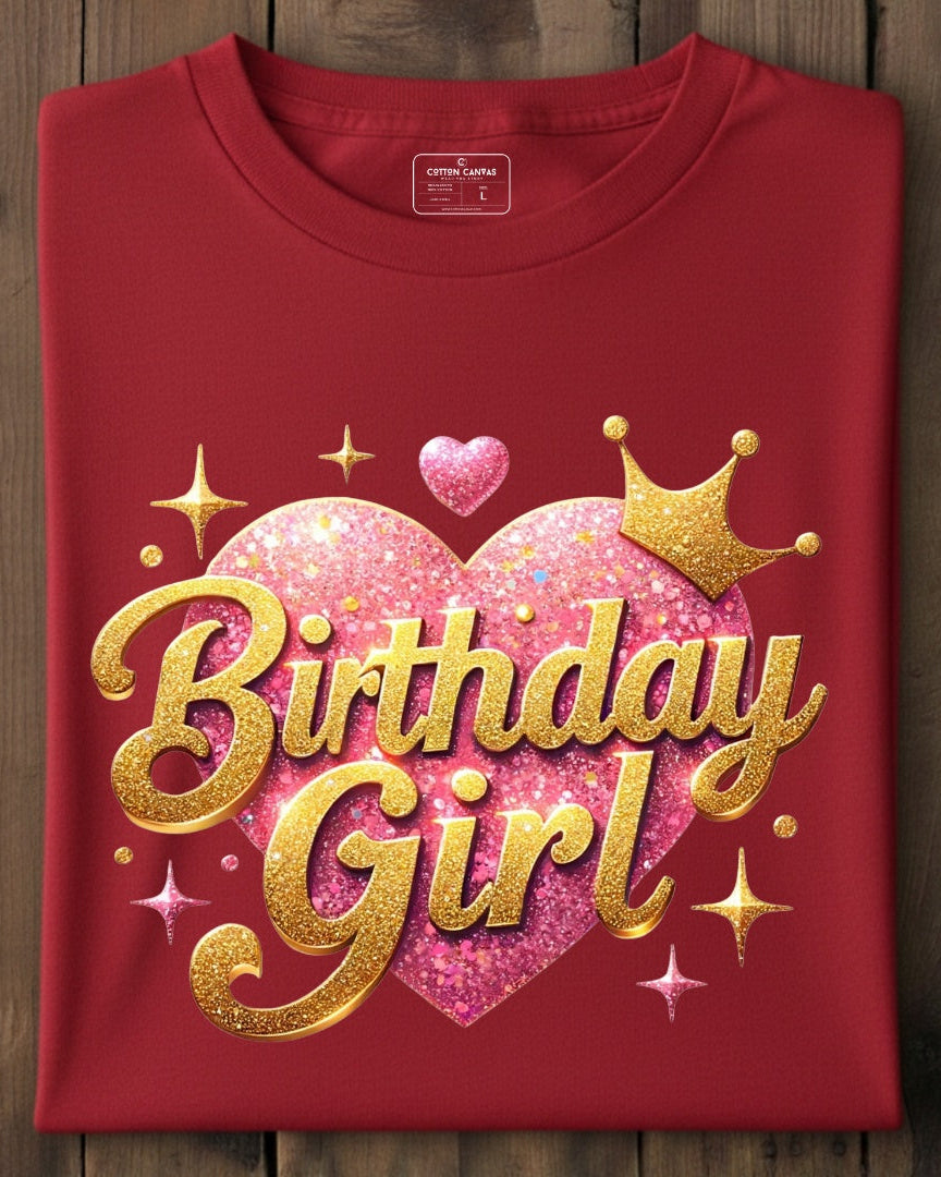 Red t-shirt with 'Birthday Girl' design on a wooden surface