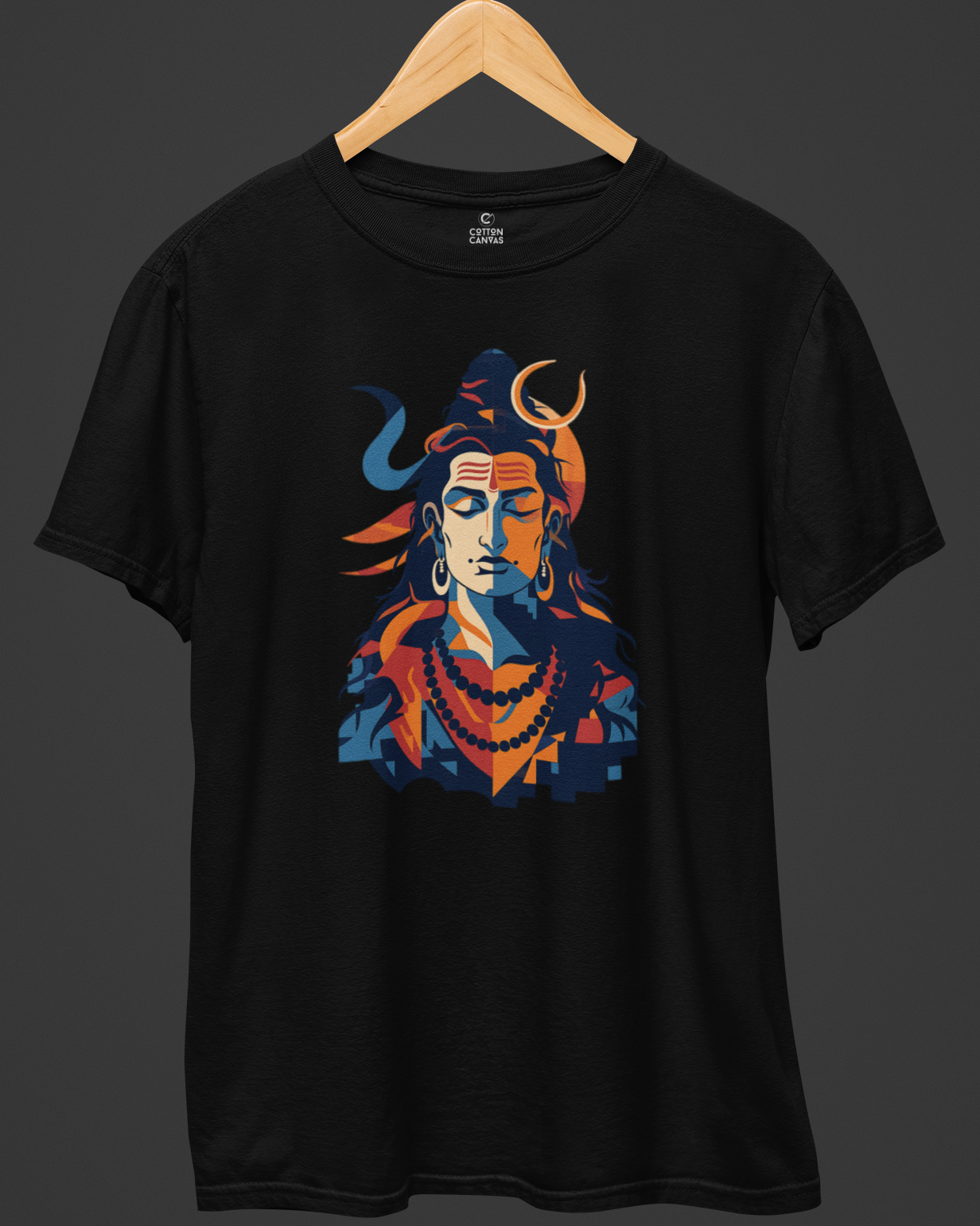 Black t-shirt with colorful graphic design on a dark background