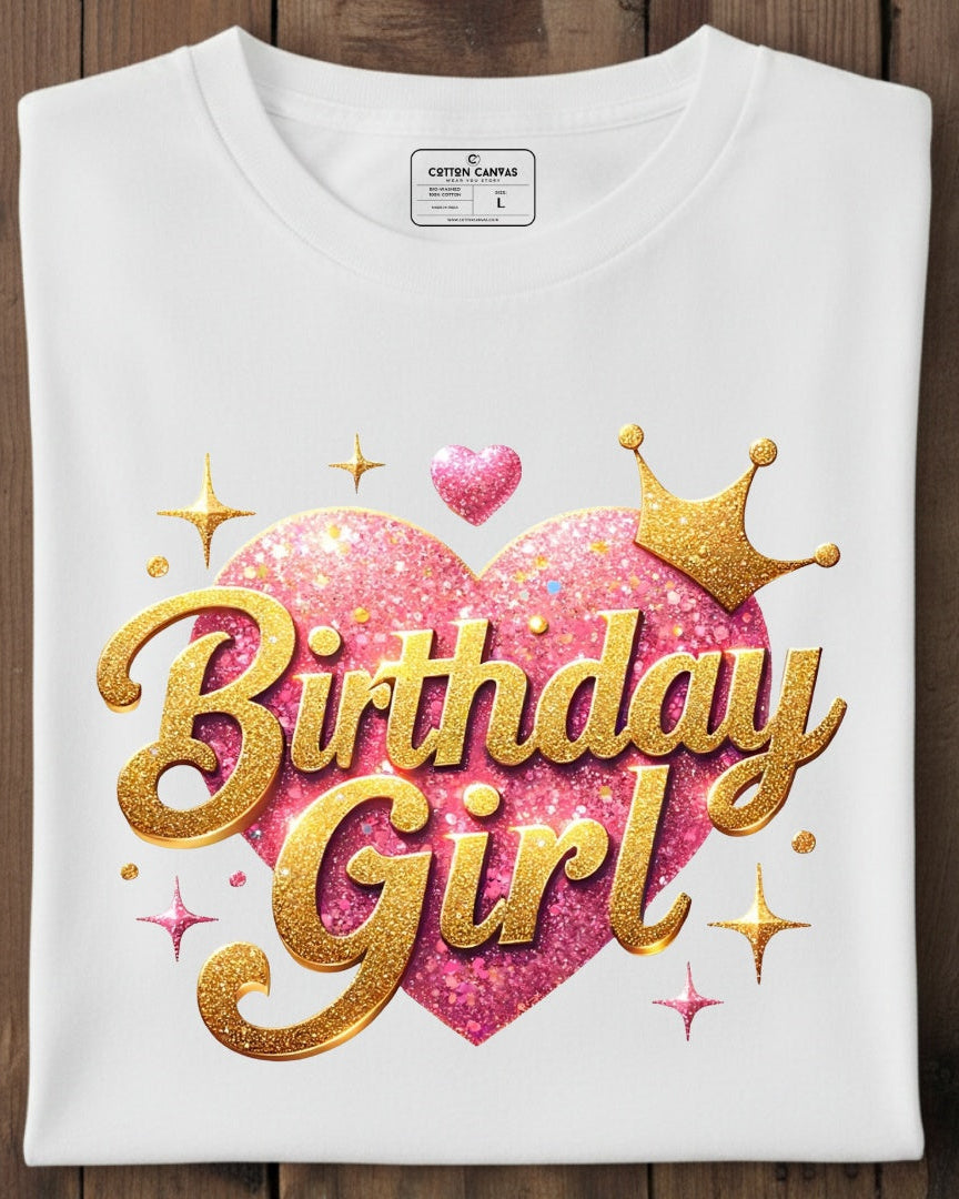White t-shirt with 'Birthday Girl' design on a wooden surface