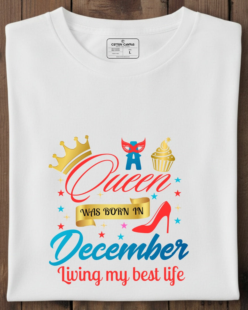 White t-shirt with colorful graphic design on a wooden surface